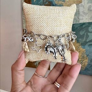 James Avery Twisted Wire connected heart bracelet with 16 Charms